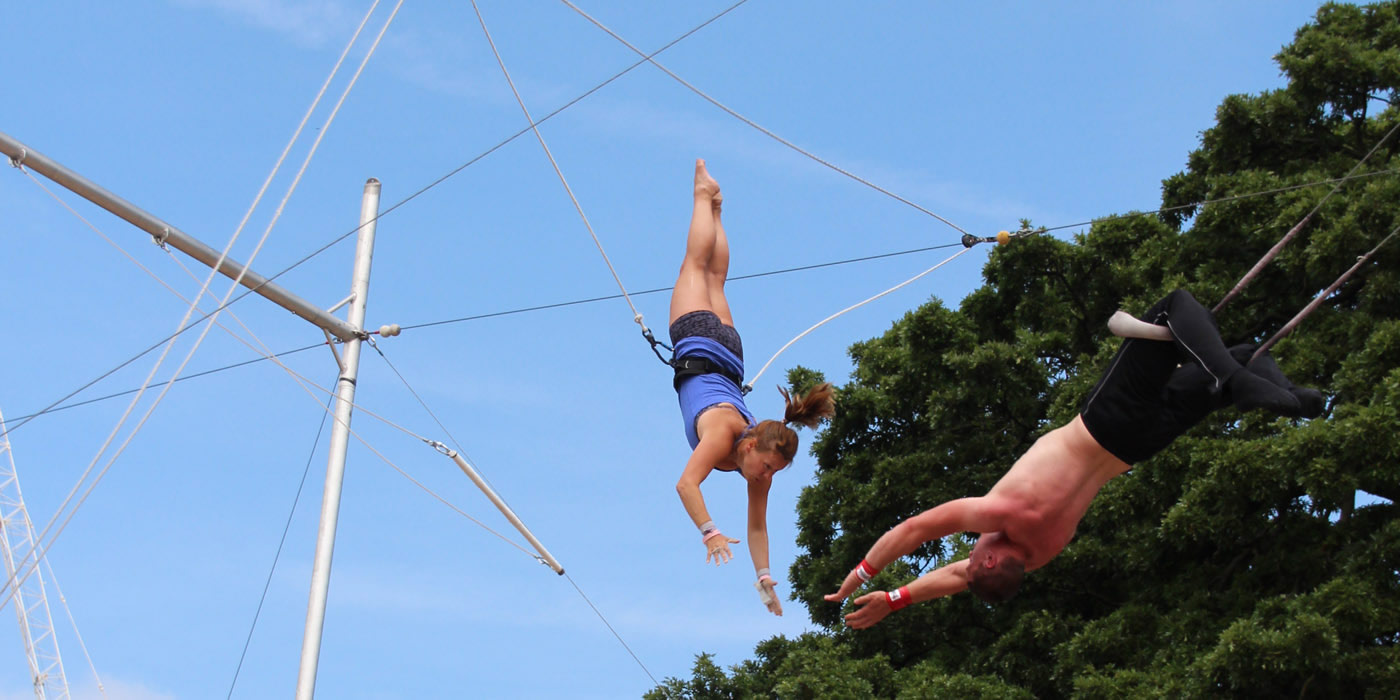 Man and woman on trapeze